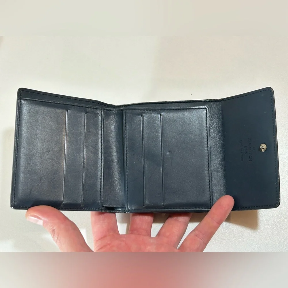 Louis Vuitton compact embossed snap